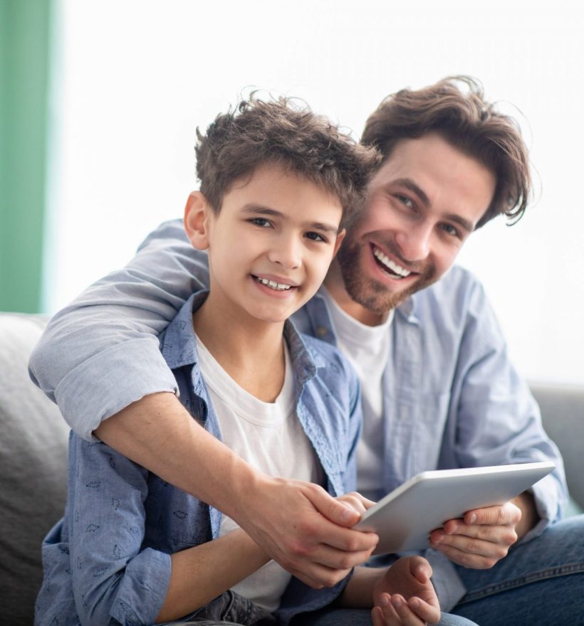 family-time-happy-dad-and-son-using-digital-tablet-browsing-internet-online-at-home-sitting-e1632233068896.jpg family-time-happy-dad-and-son-using-digital-tablet-browsing-internet-online-at-home-sitting-e1632233068896.jpg
